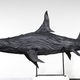 Image for article titled This Artist Turns Old Tires Into Dark, Disturbing Nightmare Monsters